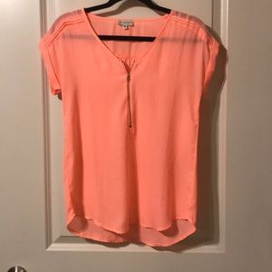 Coral top with gold zipper